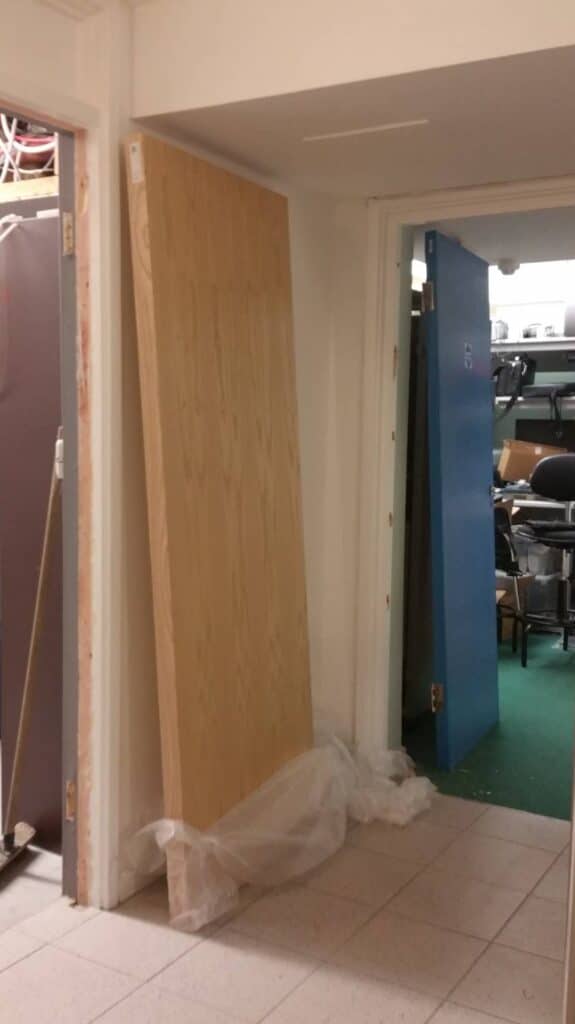 Full Installation of Internal Fire Doors in Falmouth 2 - Old doors off, new waiting to be fitted
